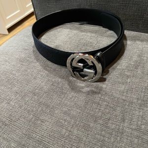 Gucci Belt with big GG buckle. Gucci prints on belt.